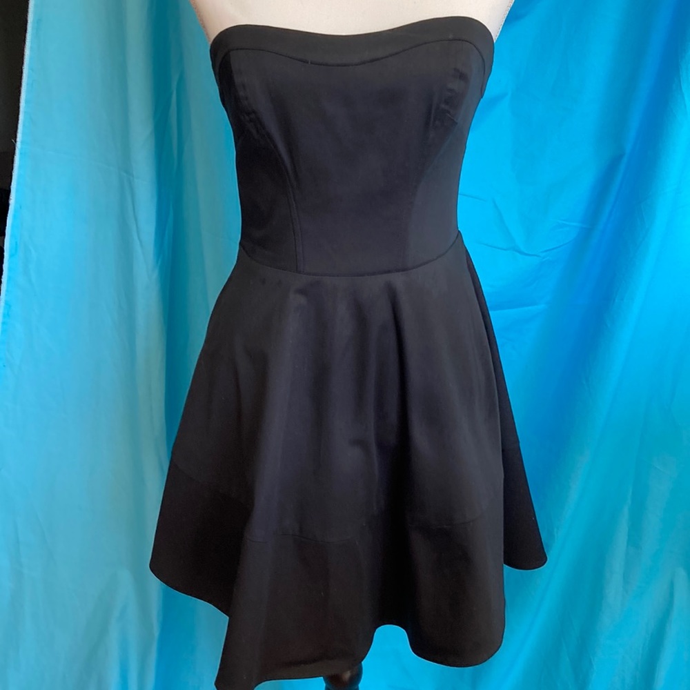 Buy2items get 1 free. 3/$25 items for$50. Black strapless, flared skirt dress